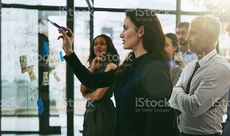 Shot of a group of business colleagues meeting in the boardroom