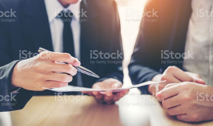 Business people Meeting negotiating a contract between two colleagues